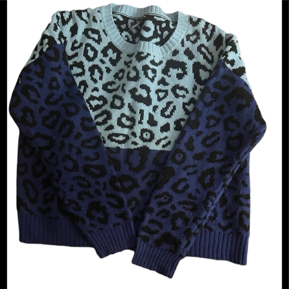 Woman’s leopard print sweater used, size large